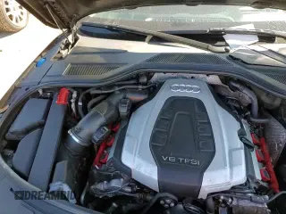 ✅ 2018 Audi A8 • VIN: WAU44AFDXJN000630 • Лот: 82514565. Опубликован ранее на Copart с пробегом 56 976 миль. Бесплатный доступ к архиву аукционных продаж из США и подробный отчёт об истории автомобиля на DreamBid. Изображение 14.