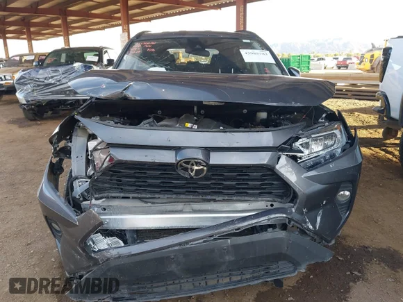 ✅ 2021 Toyota RAV4 XLE • VIN: 2T3W1RFV5MW165218 • Lot: 43985783. Listed on IAAI with 65,970 mi. Free auction sales archive from the USA and detailed vehicle history report at DreamBid. Image 6.