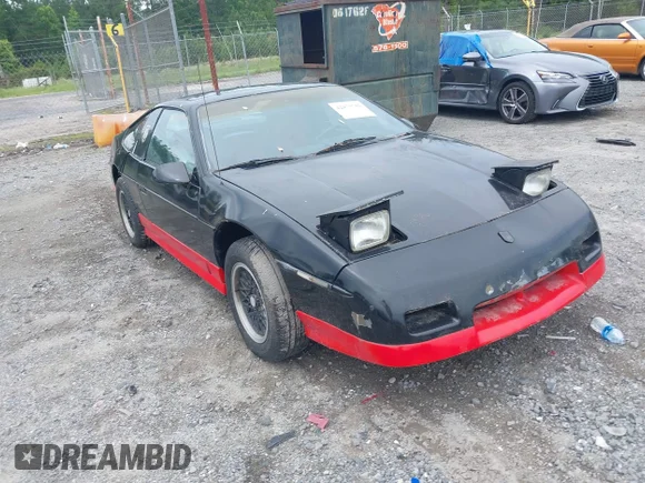 ✅ 1987 Pontiac Fiero GT • VIN: 1G2PG1192HP227632 • Lot: 42473742. Wystawiony na IAAI z przebiegiem 154 396 mil. Bezpłatny archiwum sprzedaży aukcyjnych z USA i szczegółowy raport historii pojazdu na DreamBid. Zdjęcie 1.