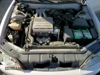 ✅ 1994 Lexus ES 300 • VIN: JT8GK13T1R0051202 • Lot: 83668264. Listed on Copart with 165,148 mi. Free auction sales archive from the USA and detailed vehicle history report at DreamBid. Image 13.