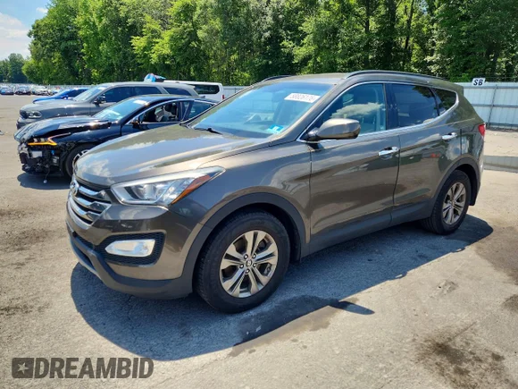 ✅ 2014 Hyundai Santa Fe • VIN: 5XYZUDLB6EG156013 • Lot: 58826176. Listed on Copart with 101,960 mi. Free auction sales archive from the USA and detailed vehicle history report at DreamBid. Image 1.