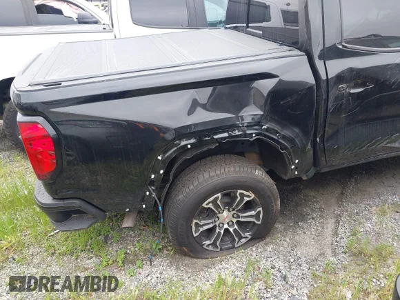 ✅ 2023 GMC Canyon 4WD AT4 • VIN: 1GTP6DEKXP1227716 • Lot: 44095354. Wystawiony na IAAI z przebiegiem Nie podano. Bezpłatny archiwum sprzedaży aukcyjnych z USA i szczegółowy raport historii pojazdu na DreamBid. Zdjęcie 4.