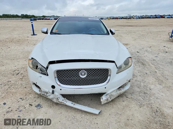 ✅ 2012 Jaguar XJ XJL • VIN: SAJWA2GB9CLV28974 • Lot: 55335166. Wystawiony na Copart z przebiegiem 102 838 mil. Bezpłatny archiwum sprzedaży aukcyjnych z USA i szczegółowy raport historii pojazdu na DreamBid. Zdjęcie 5.