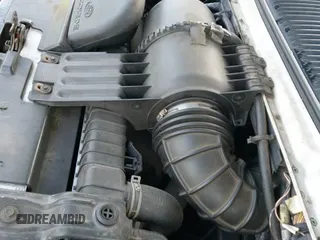 ✅ 2003 Ford Econoline Passenger XL • VIN: 1FBNE31L73HA90050 • Lot: 41453613. Wystawiony na IAAI z przebiegiem 266 652 mil. Bezpłatny archiwum sprzedaży aukcyjnych z USA i szczegółowy raport historii pojazdu na DreamBid. Zdjęcie 14.