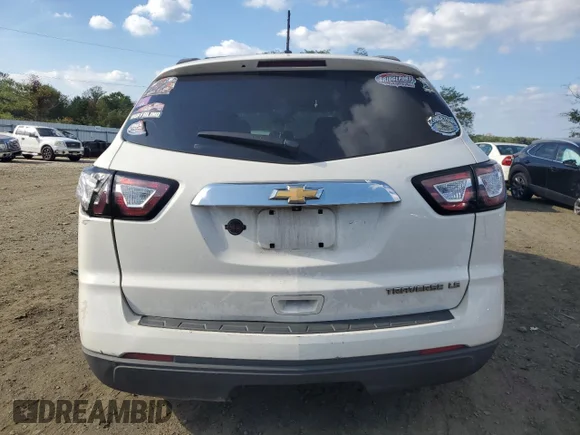 ✅ 2013 Chevrolet Traverse LS • VIN: 1GNKRFED4DJ100963 • Lot: 73661914. Wystawiony na Copart z przebiegiem 260 986 mil. Bezpłatny archiwum sprzedaży aukcyjnych z USA i szczegółowy raport historii pojazdu na DreamBid. Zdjęcie 6.