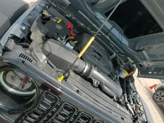 ✅ 2024 Jeep Wrangler Sport S • VIN: 1C4RJXN6XRW361840 • Lot: 69401445. Listed on Copart with 10,113 mi. Free auction sales archive from the USA and detailed vehicle history report at DreamBid. Image 14.