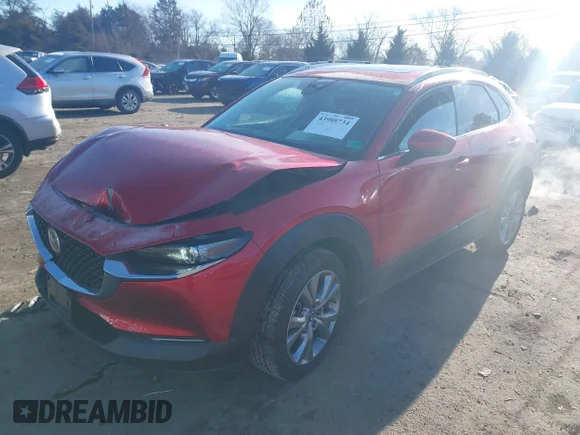 ✅ 2021 Mazda CX-30 Premium • VIN: 3MVDMADLXMM248855 • Lot: 43988734. Listed on IAAI with 59,543 mi. Free auction sales archive from the USA and detailed vehicle history report at DreamBid. Image 2.