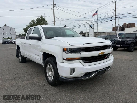 ✅ 2016 Chevrolet Silverado 1500 LT • VIN: 1GCVKREC0GZ404235 • Lot: 45456262. Listed on IAAI with 176,732 mi. Free auction sales archive from the USA and detailed vehicle history report at DreamBid. Image 1.