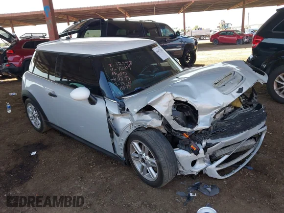 ✅ 2011 MINI Hardtop S • VIN: WMWSV3C59BTY12009 • Lot: 40472244. Listed on IAAI with 154,523 mi. Free auction sales archive from the USA and detailed vehicle history report at DreamBid. Image 1.