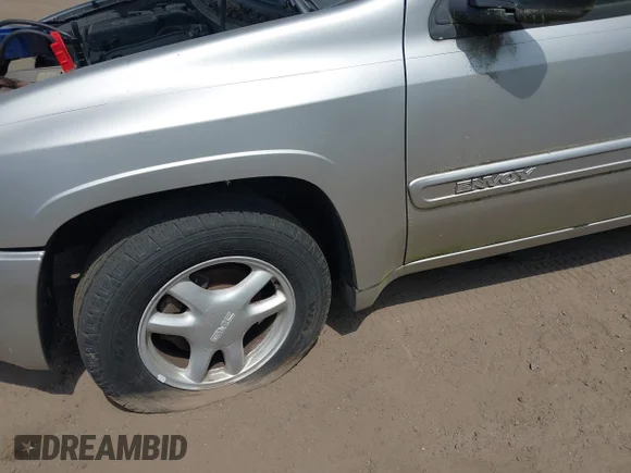 ✅ 2004 GMC Envoy SLT • VIN: 1GKDT13S442384861 • Lot: 45315141. Wystawiony na IAAI z przebiegiem 96 735 mil. Bezpłatny archiwum sprzedaży aukcyjnych z USA i szczegółowy raport historii pojazdu na DreamBid. Zdjęcie 6.