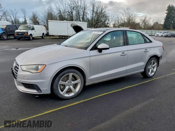✅ 2015 Audi A3 Premium • VIN: WAUBFGFF4F1047849 • Лот: 98704625. Опубліковано раніше на Copart з пробігом 27 854 миль. Безкоштовний доступ до архіву аукціонних продажів зі США та докладний звіт про історію автомобіля на DreamBid. Зображення 1.