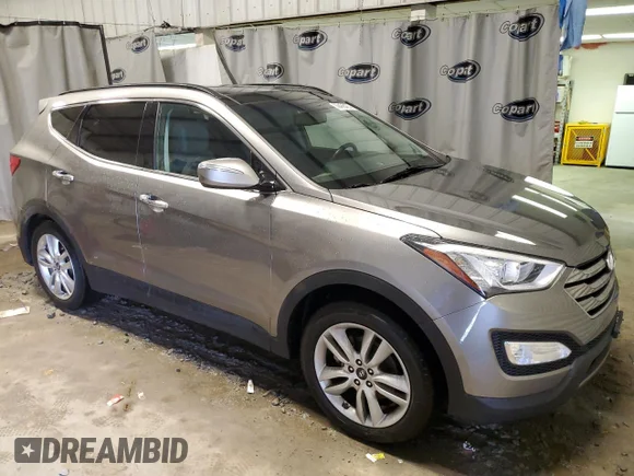 ✅ 2016 Hyundai Santa Fe • VIN: 5XYZW4LA2GG372073 • Lot: 39466403. Wystawiony na Copart z przebiegiem 98 803 mil. Bezpłatny archiwum sprzedaży aukcyjnych z USA i szczegółowy raport historii pojazdu na DreamBid. Zdjęcie 4.