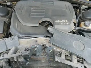 ✅ 2014 Dodge Charger SXT • VIN: 2C3CDXHGXEH358791 • Лот: 42751621. Опубликован ранее на IAAI с пробегом 203 349 миль. Бесплатный доступ к архиву аукционных продаж из США и подробный отчёт об истории автомобиля на DreamBid. Изображение 19.