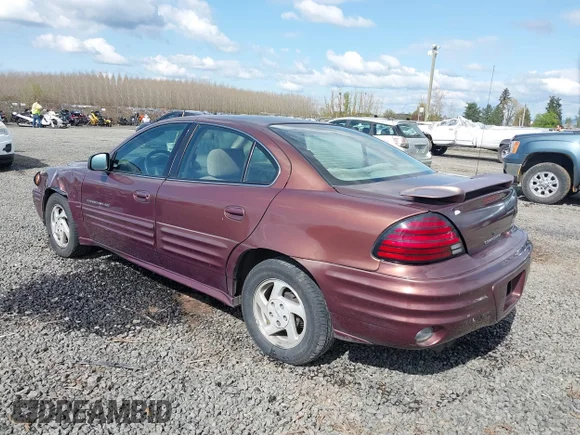 ✅ 2000 Pontiac Grand Am SE1 • VIN: 1G2NF52E0YM750436 • Lot: 41959788. Wystawiony na IAAI z przebiegiem 138 846 mil. Bezpłatny archiwum sprzedaży aukcyjnych z USA i szczegółowy raport historii pojazdu na DreamBid. Zdjęcie 3.