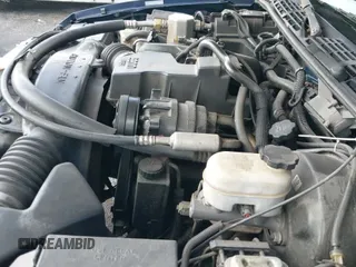 2003 Chevrolet S-10 Fleet z VIN 1GCCS14H638112255, wystawiony jako IAAI lot #43059532 z przebiegiem 215 844 mil mil oraz . Historia ofert i sprzedaży dostępna na DreamBid. Obrazek 14.