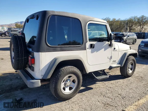 ✅ 2005 Jeep Wrangler Sport • VIN: 1J4FA49S55P343351 • Лот: 72794195. Опубліковано раніше на Copart з пробігом 171 941 миль. Безкоштовний доступ до архіву аукціонних продажів зі США та докладний звіт про історію автомобіля на DreamBid. Зображення 3.