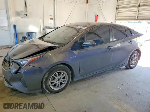 ✅ 2018 Toyota Prius Three • VIN: JTDKARFUXJ3551153 • Лот: 50407846. Опубліковано раніше на Copart з пробігом 246 389 миль. Безкоштовний доступ до архіву аукціонних продажів зі США та докладний звіт про історію автомобіля на DreamBid. Зображення 1.