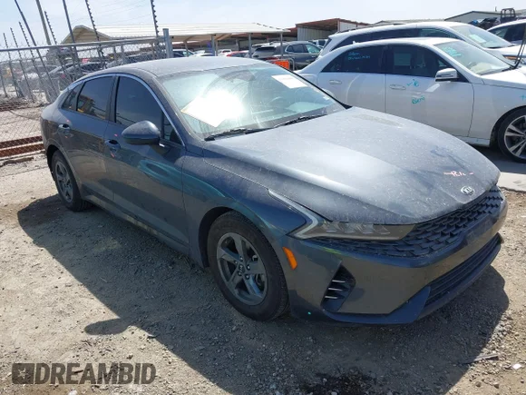 ✅ 2021 Kia K5 LXS • VIN: 5XXG14J25MG054840 • Лот: 41801061. Опубликован ранее на IAAI с пробегом 67 746 миль. Бесплатный доступ к архиву аукционных продаж из США и подробный отчёт об истории автомобиля на DreamBid. Изображение 1.