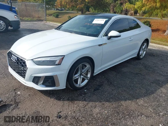 ✅ 2021 Audi A5 S line Premium Plus • VIN: WAUTAAF55MA063241 • Лот: 43687850. Опубліковано раніше на IAAI з пробігом 55 068 миль. Безкоштовний доступ до архіву аукціонних продажів зі США та докладний звіт про історію автомобіля на DreamBid. Зображення 2.