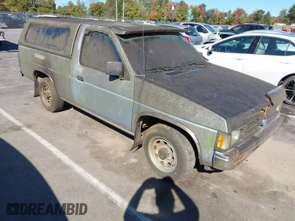 ✅ 1991 Nissan Frontier XE • VIN: 1N6SD11S9MC424670 • Lot: 43478214. Listed on IAAI with 139,469 mi. Free auction sales archive from the USA and detailed vehicle history report at DreamBid. Image 1.