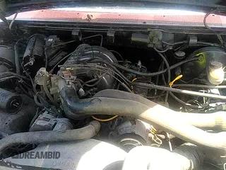 ✅ 1990 Ford Bronco XL • VIN: 1FMEU15N7LLA25223 • Lot: 41858217. Listed on IAAI with 196,000 mi. Free auction sales archive from the USA and detailed vehicle history report at DreamBid. Image 14.