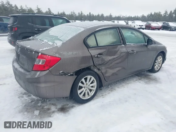 ✅ 2012 Honda Civic EX • VIN: 2HGFB2F84CH610661 • Lot: 44085923. Listed on IAAI with 112,437 mi. Free auction sales archive from the USA and detailed vehicle history report at DreamBid. Image 4.
