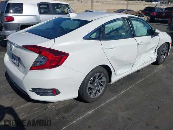 ✅ 2018 Honda Civic EX • VIN: 19XFC2F70JE206185 • Lot: 44073103. Wystawiony na IAAI z przebiegiem 78 338 mil. Bezpłatny archiwum sprzedaży aukcyjnych z USA i szczegółowy raport historii pojazdu na DreamBid. Zdjęcie 4.