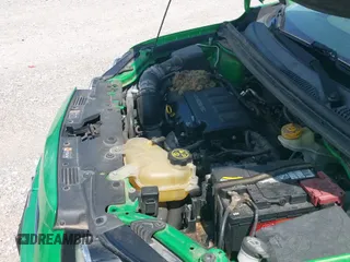 2015 Chevrolet Sonic LT z VIN 1G1JC6SB7F4147472, wystawiony jako IAAI lot #42860588 z przebiegiem 126 909 mil mil oraz . Historia ofert i sprzedaży dostępna na DreamBid. Obrazek 12.