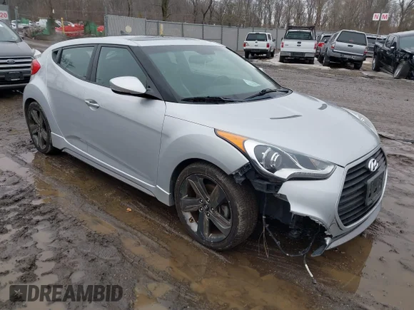 ✅ 2015 Hyundai Veloster Turbo • VIN: KMHTC6AE7FU236241 • Lot: 44231079. Listed on IAAI with 82,751 mi. Free auction sales archive from the USA and detailed vehicle history report at DreamBid. Image 1.