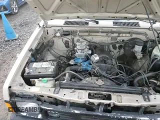 ✅ 1986 Nissan Hardbody E • VIN: JN6ND11S1GW037479 • Lot: 81775934. Wystawiony na Copart z przebiegiem 389 841 mil. Bezpłatny archiwum sprzedaży aukcyjnych z USA i szczegółowy raport historii pojazdu na DreamBid. Zdjęcie 12.