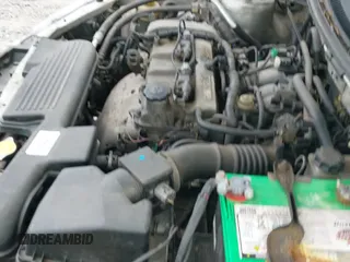 ✅ 2003 Mazda Protege DX • VIN: JM1BJ225331136793 • Lot: 42775972. Listed on IAAI with 188,046 mi. Free auction sales archive from the USA and detailed vehicle history report at DreamBid. Image 12.