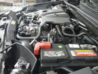 2021 Toyota Camry XSE with VIN 4T1K61BK6MU031856, listed as a IAAI auction lot 42365471 with 59,209 mi miles and . Bid and sale history available at DreamBid. Image 19.