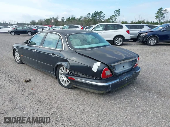 ✅ 2004 Jaguar XJ 8 • VIN: SAJWA71C24SG29444 • Lot: 44499116. Wystawiony na IAAI z przebiegiem 82 114 mil. Bezpłatny archiwum sprzedaży aukcyjnych z USA i szczegółowy raport historii pojazdu na DreamBid. Zdjęcie 3.