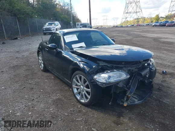 ✅ 2009 Mazda MX-5 Miata Grand Touring • VIN: JM1NC26F290202226 • Lot: 43522077. Listed on IAAI with 156,711 mi. Free auction sales archive from the USA and detailed vehicle history report at DreamBid. Image 1.