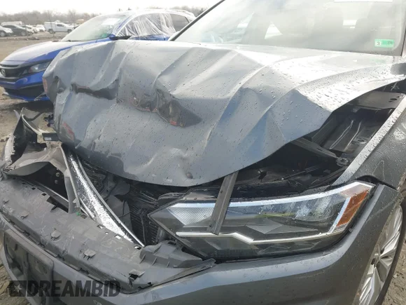 ✅ 2019 Volkswagen Jetta S • VIN: 3VWC57BU8KM018394 • Lot: 44394082. Wystawiony na IAAI z przebiegiem 100 358 mil. Bezpłatny archiwum sprzedaży aukcyjnych z USA i szczegółowy raport historii pojazdu na DreamBid. Zdjęcie 6.