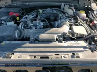 ✅ 2023 Jeep Wrangler Sport • VIN: 1C4HJXDG6PW678579 • Lot: 80864055. Wystawiony na Copart z przebiegiem 27 697 mil. Bezpłatny archiwum sprzedaży aukcyjnych z USA i szczegółowy raport historii pojazdu na DreamBid. Zdjęcie 13.