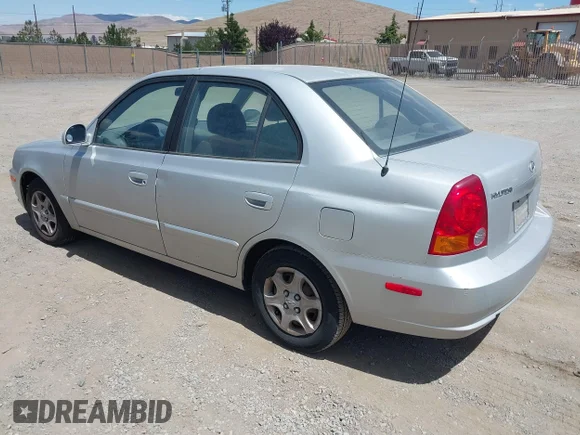 ✅ 2003 Hyundai Accent GL • VIN: KMHCG45C13U430017 • Lot: 42625444. Wystawiony na IAAI z przebiegiem 151 458 mil. Bezpłatny archiwum sprzedaży aukcyjnych z USA i szczegółowy raport historii pojazdu na DreamBid. Zdjęcie 3.