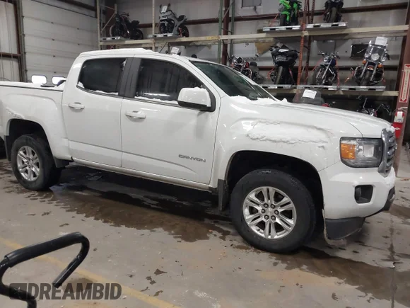 ✅ 2019 GMC Canyon 4WD SLE • VIN: 1GTG6CEN1K1205763 • Лот: 43801691. Опубликован ранее на IAAI с пробегом 106 657 миль. Бесплатный доступ к архиву аукционных продаж из США и подробный отчёт об истории автомобиля на DreamBid. Изображение 1.