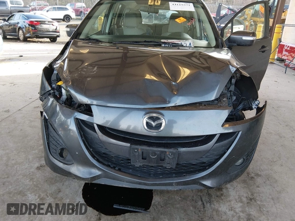 ✅ 2013 Mazda 5 Touring • VIN: JM1CW2CL5D0156005 • Lot: 44119371. Listed on IAAI with 157,368 mi. Free auction sales archive from the USA and detailed vehicle history report at DreamBid. Image 6.