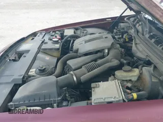 ✅ 2005 Mercury Grand Marquis GS • VIN: 2MEFM74W65X639402 • Лот: 42506633. Опубликован ранее на IAAI с пробегом 136 442 миль. Бесплатный доступ к архиву аукционных продаж из США и подробный отчёт об истории автомобиля на DreamBid. Изображение 19.