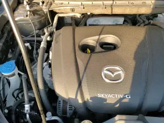 ✅ 2020 Mazda CX-5 Touring • VIN: JM3KFACM6L0771540 • Lot: 82485925. Listed on Copart with 89,177 mi. Free auction sales archive from the USA and detailed vehicle history report at DreamBid. Image 16.