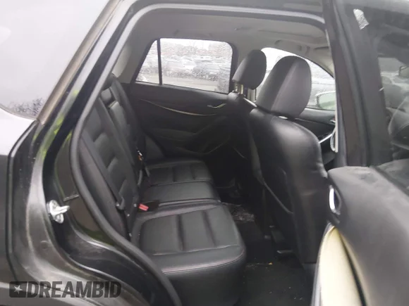 ✅ 2013 Mazda CX-5 Grand Touring • VIN: JM3KE4DEXD0113961 • Лот: 44599430. Опубліковано раніше на IAAI з пробігом 141 254 миль. Безкоштовний доступ до архіву аукціонних продажів зі США та докладний звіт про історію автомобіля на DreamBid. Зображення 8.