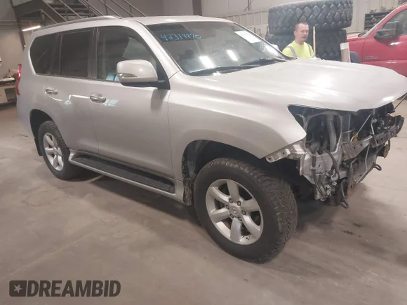 ✅ 2011 Lexus GX 460 • VIN: JTJBM7FX9B5033379 • Lot: 42319870. Listed on IAAI with 160,900 mi. Free auction sales archive from the USA and detailed vehicle history report at DreamBid. Image 1.