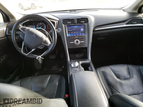 ✅ 2019 Ford Fusion Titanium • VIN: 3FA6P0D99KR253079 • Lot: 67467582. Wystawiony na Copart z przebiegiem 94 874 mil. Bezpłatny archiwum sprzedaży aukcyjnych z USA i szczegółowy raport historii pojazdu na DreamBid. Zdjęcie 8.