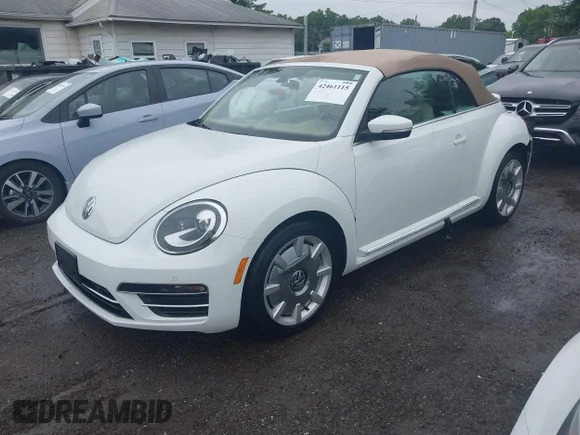 ✅ 2017 Volkswagen Beetle S • VIN: 3VW517AT1HM809338 • Lot: 42461115. Wystawiony na IAAI z przebiegiem 74 782 mil. Bezpłatny archiwum sprzedaży aukcyjnych z USA i szczegółowy raport historii pojazdu na DreamBid. Zdjęcie 2.