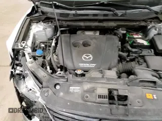 ✅ 2016 Mazda CX-5 Touring • VIN: JM3KE4CY7G0647483 • Lot: 84598525. Wystawiony na Copart z przebiegiem 104 142 mil. Bezpłatny archiwum sprzedaży aukcyjnych z USA i szczegółowy raport historii pojazdu na DreamBid. Zdjęcie 14.