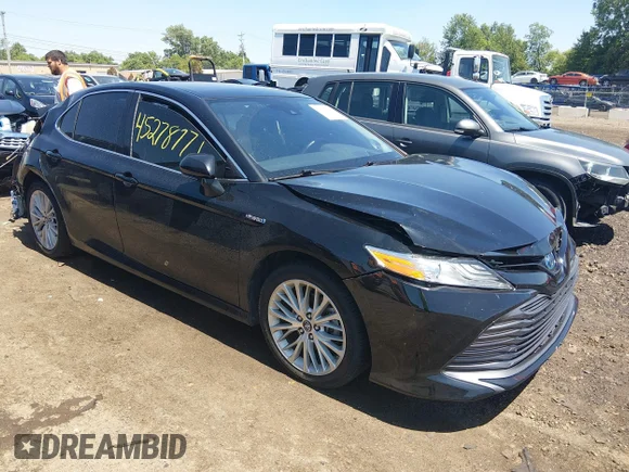 ✅ 2019 Toyota Camry Hybrid SE • VIN: 4T1B21HK2KU521923 • Лот: 45278771. Опубликован ранее на IAAI с пробегом 49 165 миль. Бесплатный доступ к архиву аукционных продаж из США и подробный отчёт об истории автомобиля на DreamBid. Изображение 1.