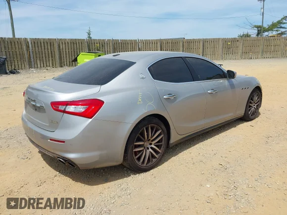 ✅ 2018 Maserati Ghibli S Q4 • VIN: ZAM57YTA8J1278706 • Lot: 45262094. Listed on IAAI with 79,423 mi. Free auction sales archive from the USA and detailed vehicle history report at DreamBid. Image 4.