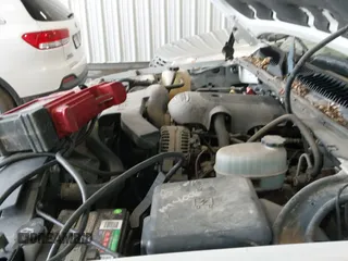 2005 Chevrolet Suburban LS z VIN 1GNFK16Z45J176719, wystawiony jako IAAI lot #42325067 z przebiegiem 199 884 mil mil oraz . Historia ofert i sprzedaży dostępna na DreamBid. Obrazek 22.