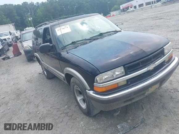 ✅ 1999 Chevrolet Blazer LT • VIN: 1GNCS13W1X2169673 • Lot: 42778174. Listed on IAAI with 127,038 mi. Free auction sales archive from the USA and detailed vehicle history report at DreamBid. Image 1.